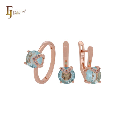 Conjunto de joyas de oro rosa con anillos y flecha de circonitas blancas en forma de chevrón, solitario con circonitas azul lago.