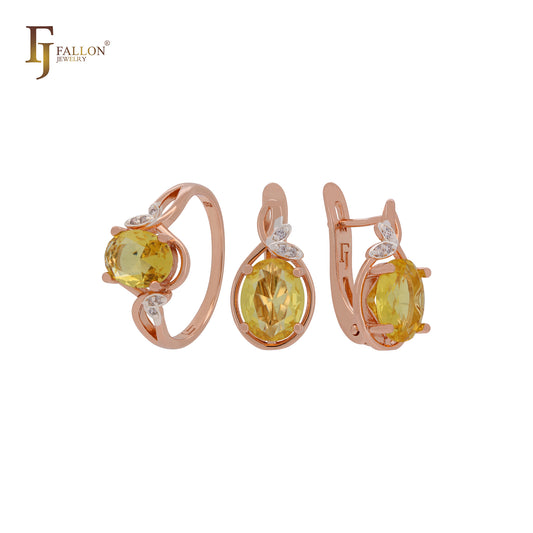 Conjunto de joyas en dos tonos de oro rosa con solitario de circonitas naranjas y hojas de circonitas blancas y anillos.