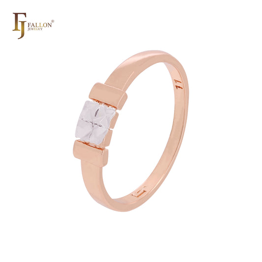 Anillo de boda minimalista de oro rosa con cuatro rombos cruzados y cuadrados.