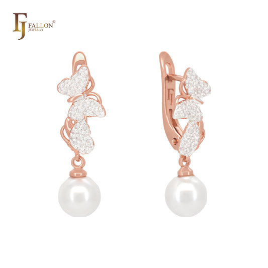 Pendientes de clip bicolor de mariposa y corazón de circonitas blancas y perla en oro rosa.