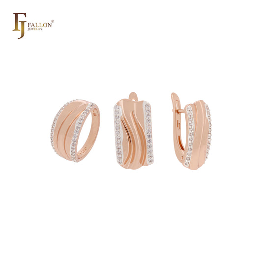 Conjunto de joyas de oro rosa de dos tonos con anillos y bandas anchas con circonitas blancas pavimentadas en los laterales.