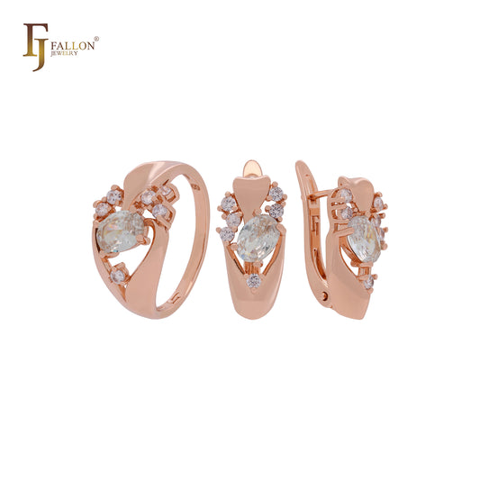 Lujoso conjunto de joyas de oro rosa con circonitas blancas, esmeralda o café y anillos.
