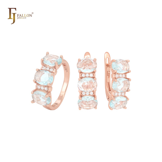 Conjunto de joias em ouro rosa com anéis e três zircônias cúbicas azuis ovais e zircônias cúbicas brancas