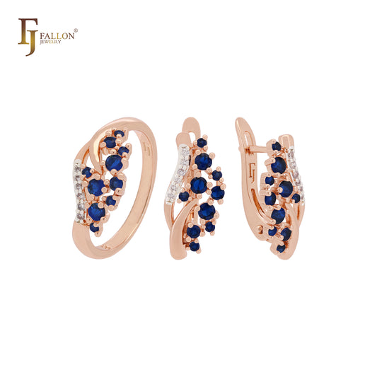 Conjunto de joyas de oro rosa de dos tonos con circonitas azules y blancas y anillos