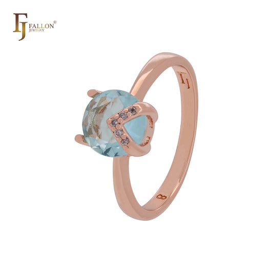 Anillos de compromiso en oro rosa con solitario de circonitas blancas y flecha de chevron con circonitas azul lago