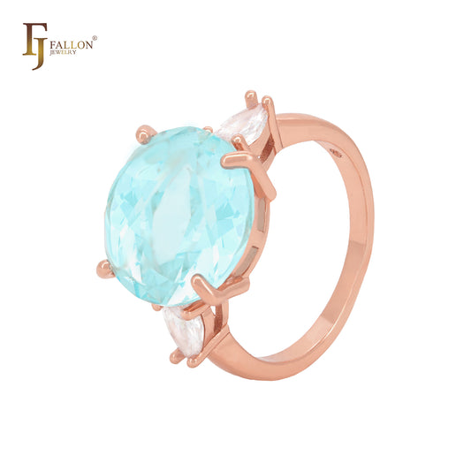 Anillos de compromiso en oro rosa con circonita azul lago gigante y dos circonitas blancas