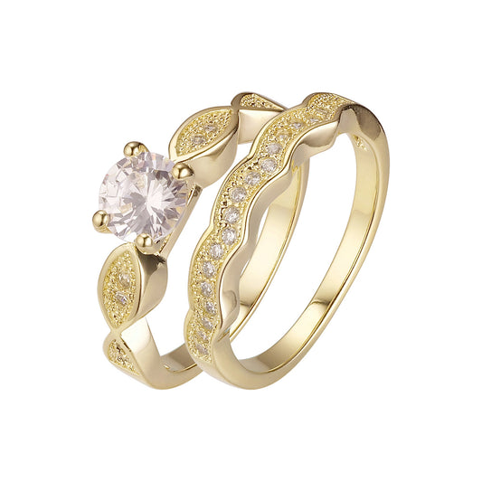 Anillos apilables de grupo de bandas torcidas enchapados en Oro 14K