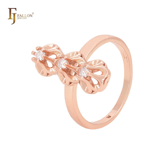 Anillos de moda en oro rosa con circonitas blancas de triple garra