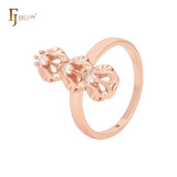 Anillos de moda en oro rosa con circonitas blancas de triple garra