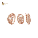 Conjunto de joyas de oro rosa entrelazadas con circonitas blancas y anillos