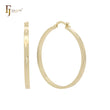 Aros anchos de 45 mm con forma de tubo brillante de oro de 14 quilates