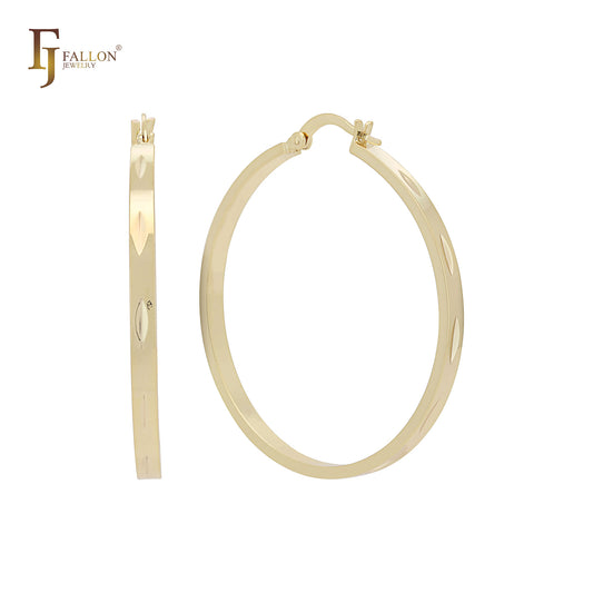 Aros anchos de 45 mm con forma de tubo brillante de oro de 14 quilates