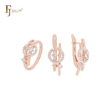 Conjunto de joyas de oro rosa de dos tonos con anillos y círculo de circonitas blancas entrelazadas.