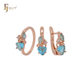 Conjunto de joyas de oro rosa con circonitas cúbicas en azul lago y anillos