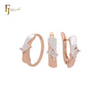Conjunto de joyas de oro rosa bicolor con solitario de circonita blanca de corte rectangular y anillos