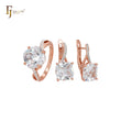 Conjunto de joyas en dos tonos de oro rosa con solitario de circonitas blancas y circonitas blancas pavimentadas y anillos.