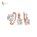 Conjunto de joyas en dos tonos de oro rosa con solitario de circonitas blancas y circonitas blancas pavimentadas y anillos.