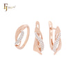 Conjunto de joyas de dos tonos en oro rosa con anillos y cintas entrelazadas de circonitas blancas