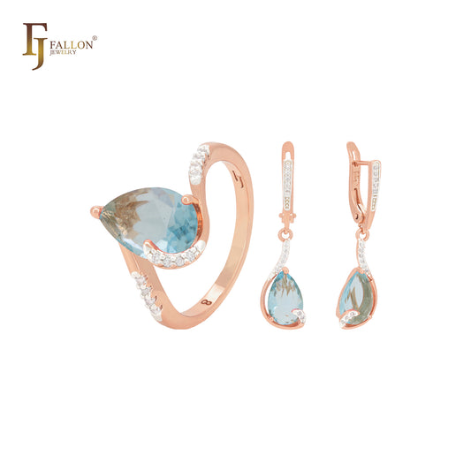 Solitario de circonita rosa en forma de pera con circonitas blancas. Conjunto de joyas de oro rosa de dos tonos con anillos.