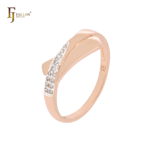 Anillos de moda bicolor en oro rosa con cintas triangulares entrelazadas y circonitas blancas.