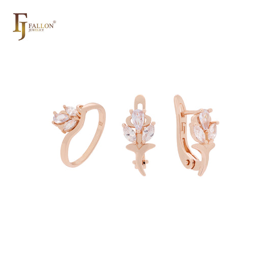 Conjunto de joyas de oro rosa con gran nudo de flor y circonitas blancas y anillos.
