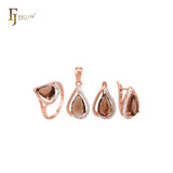 Conjunto de joyas de oro rosa de dos tonos con anillos y colgante, solitario de café en forma de pera y circonitas blancas.