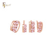 Lujoso conjunto de joyas de oro rosa con circonitas cúbicas rosadas, colgante y anillos.