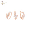 Conjunto de joyas de oro rosa de dos tonos con anillos y símbolo de rayo de circonitas blancas