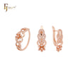Conjunto de joyas de oro rosa con anillos y flor en forma de lágrima de circonitas blancas en racimo