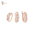Conjunto de joyas de oro rosa de dos tonos con pluma de fénix y circonitas blancas pavimentadas y anillos.
