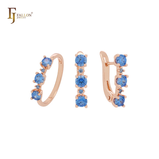 Conjunto de joyas de oro rosa con circonitas cúbicas triples redondeadas de color azul océano profundo y anillos