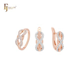 Conjunto de joyas de oro rosa de dos tonos con cruces infinitas entrelazadas con circonitas blancas y anillos.