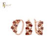 Lujoso conjunto de joyas de oro rosa con circonitas rojas y anillos