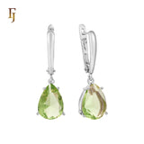 .Aretes de piedra en forma de lágrima en colores chapados en oro de 14 quilates, oro rosa y oro blanco.