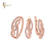 Conjunto de joyas de oro rosa con anillos y lazos cruzados entrelazados