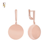 Pendientes minimalistas de clip con disco redondeado plano en oro de 14 quilates, oro rosa y oro blanco.