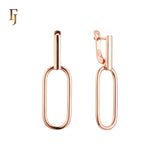 Pendientes de clip en Oro 14K, colores baño de oro rosa.