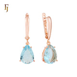 .Aretes de piedra en forma de lágrima en colores chapados en oro de 14 quilates, oro rosa y oro blanco.