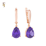 .Aretes de piedra en forma de lágrima en colores chapados en oro de 14 quilates, oro rosa y oro blanco.