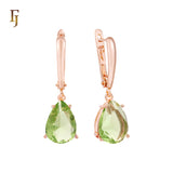 .Aretes de piedra en forma de lágrima en colores chapados en oro de 14 quilates, oro rosa y oro blanco.