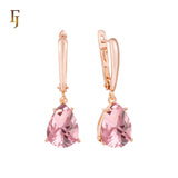 .Aretes de piedra en forma de lágrima en colores chapados en oro de 14 quilates, oro rosa y oro blanco.