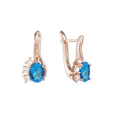 Aretes Solitario cara con tres piedras en Oro de 14K, baño de Oro Rosa colores
