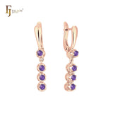 Pendientes de oro de 14 quilates, oro de 18 quilates, oro rosa y oro blanco con cuatro circonitas blancas.