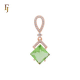 Hängender Anhänger in Rautenform mit seeblauen Zirkonia und weißem Zirkoniaband aus Roségold