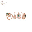 Lujoso conjunto de joyas en oro rosa de dos tonos con plumas de circonitas cúbicas, anillos y colgante.