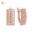 Pendientes de clip en oro rosa con cuatro circonitas blancas en forma de flanco cuadrado