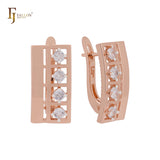 Pendientes de clip en oro rosa con cuatro circonitas blancas en forma de flanco cuadrado