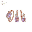 Conjunto de joyas gigantes de oro rosa de dos tonos con circonitas cúbicas redondeadas y anillos