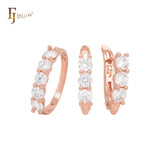 Conjunto de joyas de oro rosa con triple racimo de circonitas blancas redondeadas y anillos