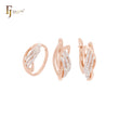 Conjunto de joyas de oro rosa bicolor con tres capas de circonitas blancas entrelazadas y anillos.